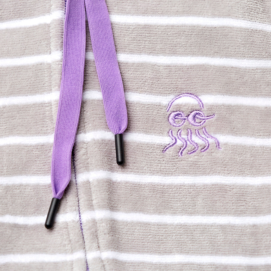 Close up of grey with purple adults beach robe 
